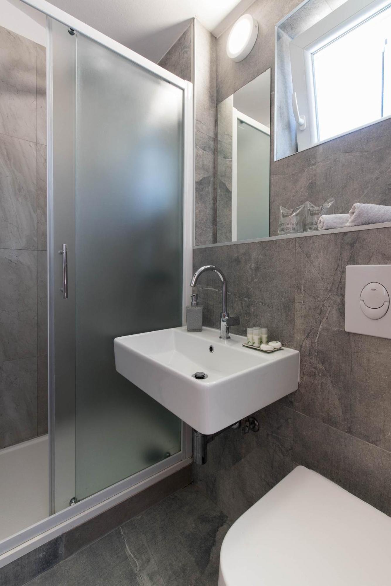 Beachfront Apartments Zanic Podstrana Kamer foto